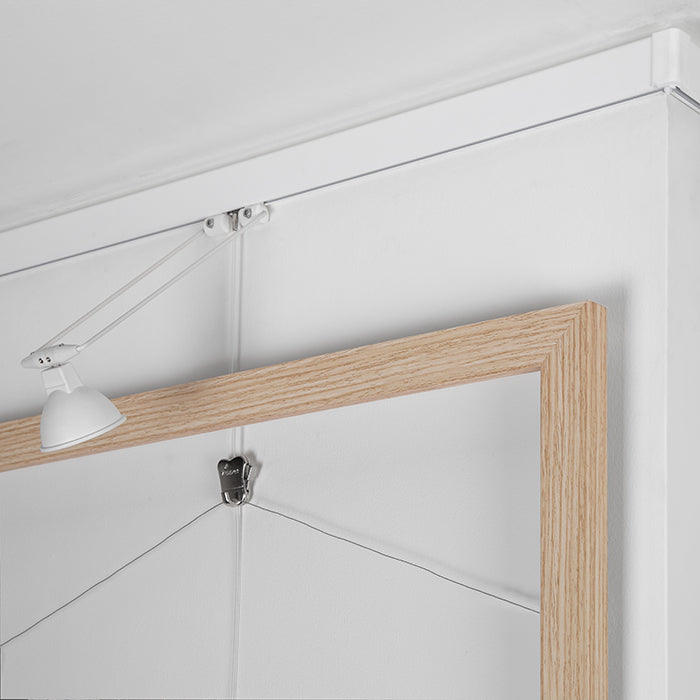 STAS multirail: elegancki system zasilania 12 V do oświetlenia obrazów.